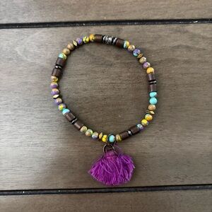 Beaded Bracelet with Purple Tassel
